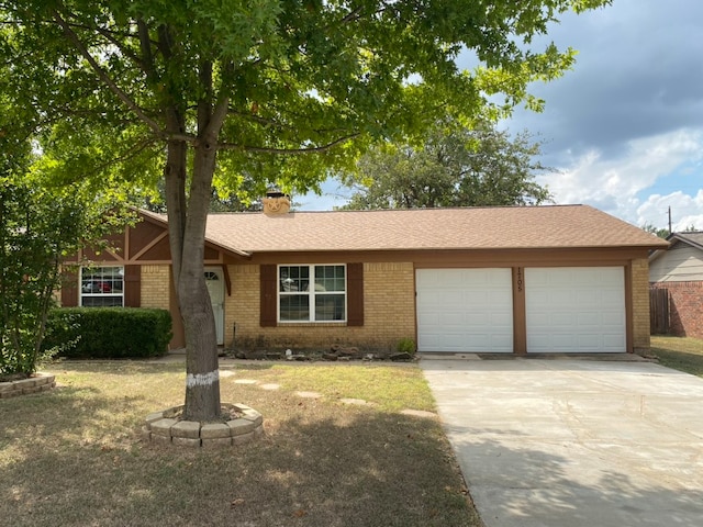 ranch-style house featuring a garage