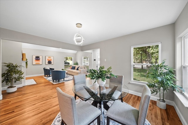 dining area featuring hardwood / wood-style floors