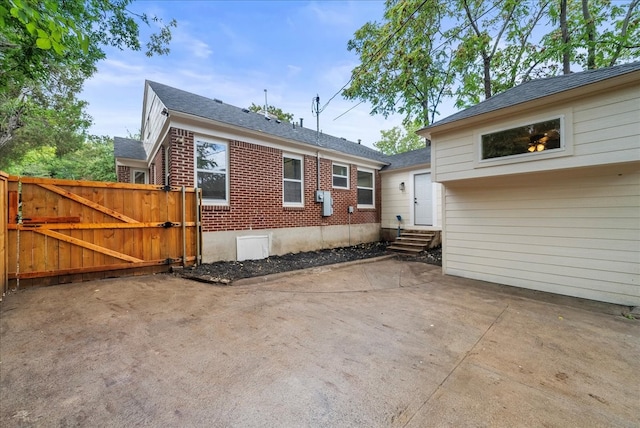 rear view of house with a patio