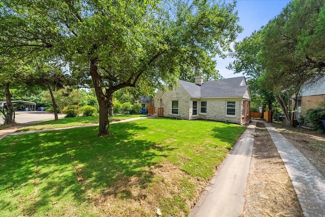 view of front of property with a front lawn