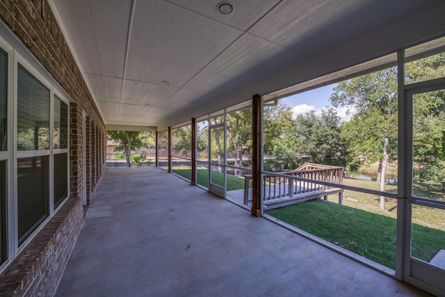 unfurnished sunroom with a wealth of natural light