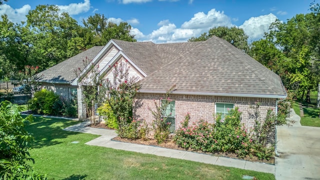 exterior space with a yard