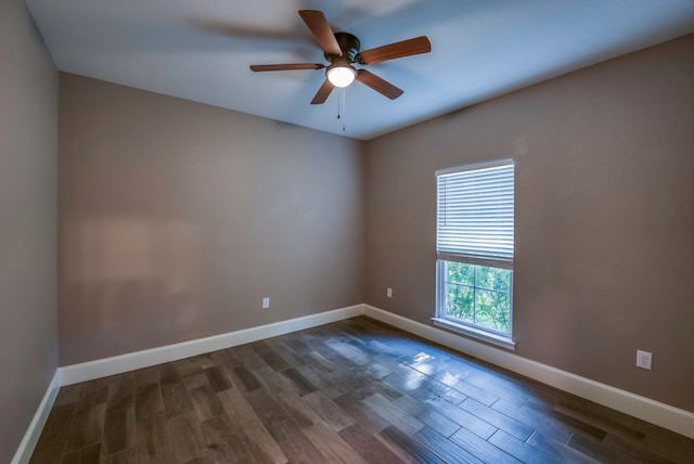 spare room featuring ceiling fan and wood-type flooring