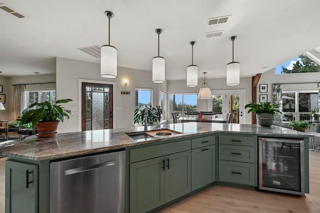 kitchen with wine cooler, decorative light fixtures, dishwasher, and green cabinets