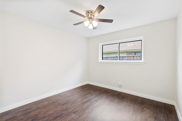 empty room featuring hardwood / wood-style flooring and ceiling fan