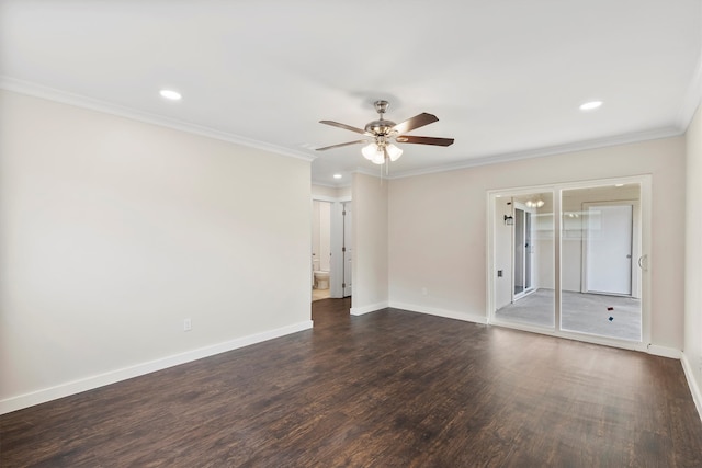 spare room featuring crown molding, ceiling fan, and dark hardwood / wood-style floors