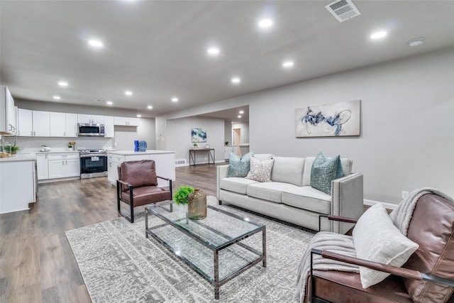 living room featuring light hardwood / wood-style flooring