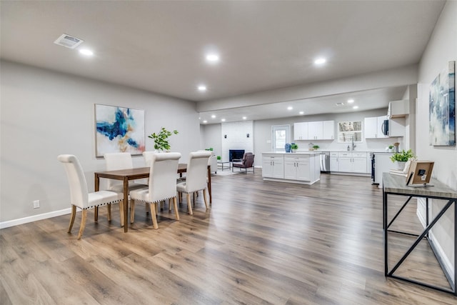 dining room featuring wood-type flooring