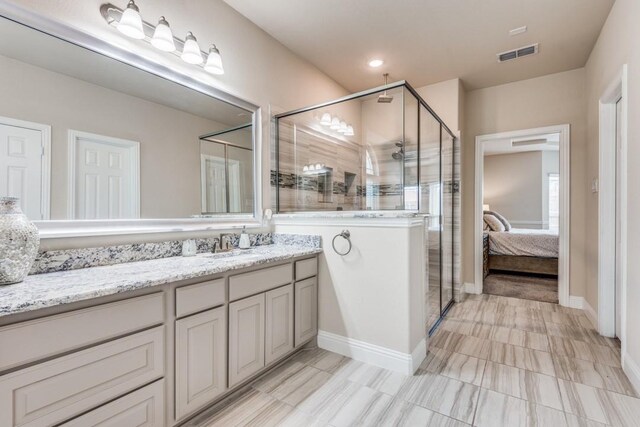 bathroom featuring vanity and walk in shower