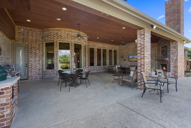 view of patio featuring ceiling fan