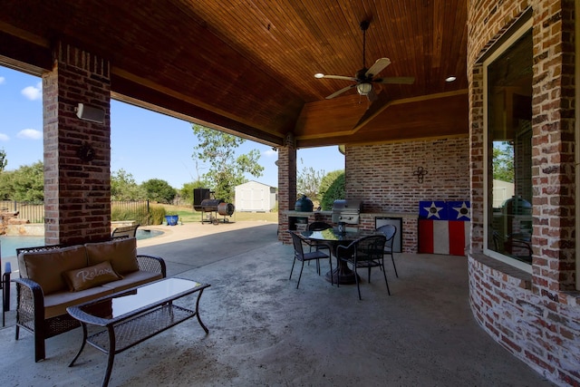 view of patio / terrace with a storage shed, outdoor lounge area, a grill, and ceiling fan