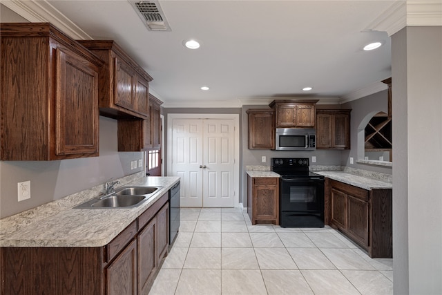 kitchen with black appliances, ornamental molding, light tile patterned flooring, and sink