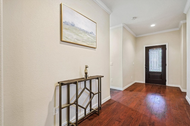 foyer featuring crown molding and dark wood-type flooring