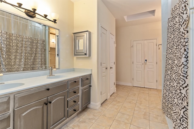 bathroom featuring tile patterned floors and vanity