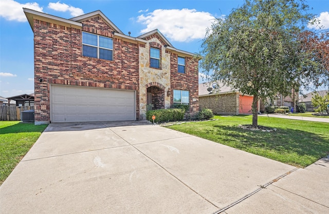 view of front of house featuring a garage and a front lawn