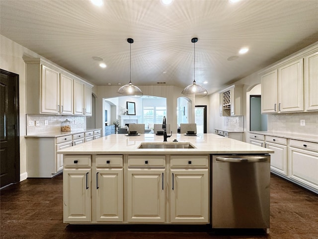 1424 Palestine Dr, Prosper, TX 75078 - kitchen with a sink, recessed lighting, an island with sink, arched walkways, and stainless steel dishwasher