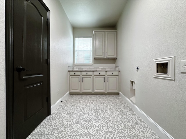 1424 Palestine Dr, Prosper, TX 75078 - laundry area featuring baseboards, hookup for an electric dryer, and cabinet space
