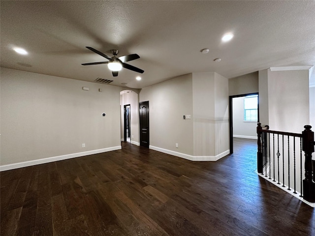 1424 Palestine Dr, Prosper, TX 75078 - spare room featuring visible vents, baseboards, dark wood-type flooring, ceiling fan, and recessed lighting
