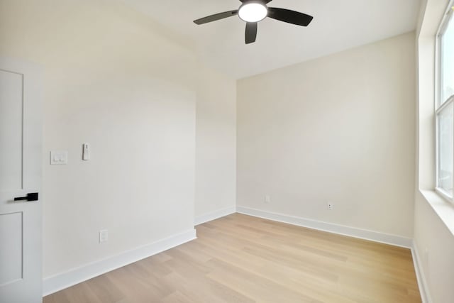 spare room with ceiling fan and light hardwood / wood-style floors