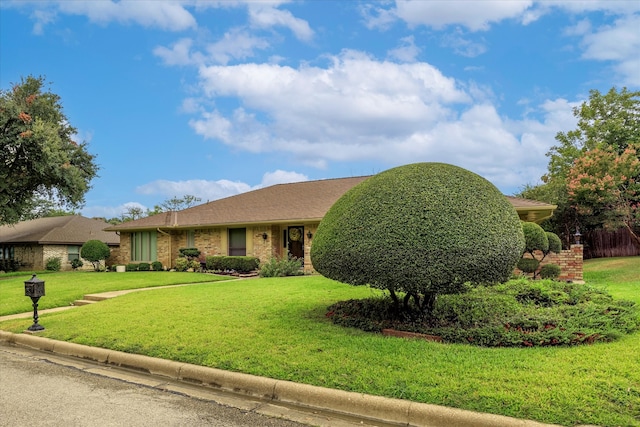 view of front of house with a front lawn