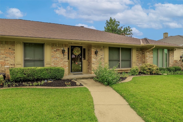 exterior space featuring a front lawn