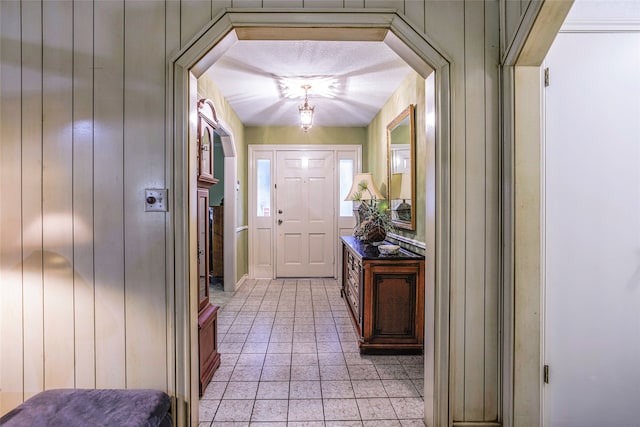 doorway to outside featuring light tile patterned floors