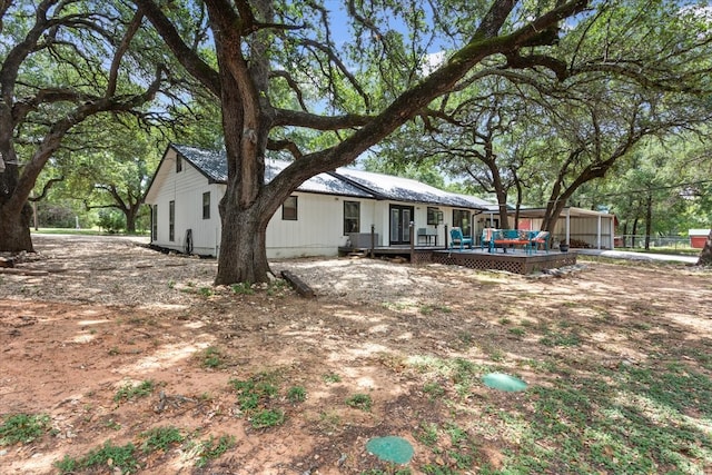 exterior space featuring a deck