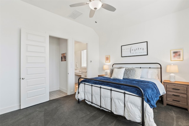 carpeted bedroom with connected bathroom and ceiling fan