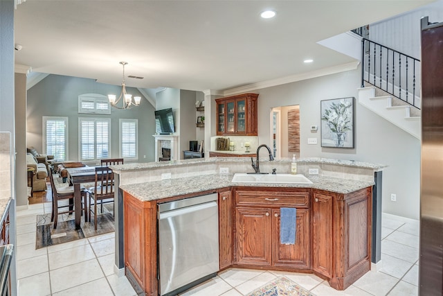 kitchen with dishwasher, sink, pendant lighting, a center island with sink, and ornamental molding