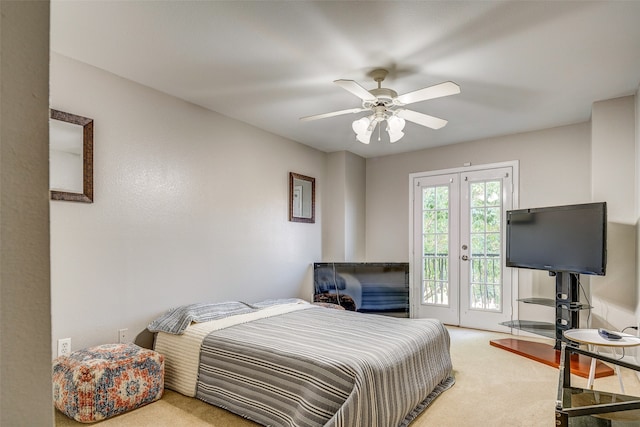 carpeted bedroom featuring access to exterior, ceiling fan, and french doors