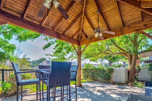 view of patio / terrace featuring a gazebo and ceiling fan