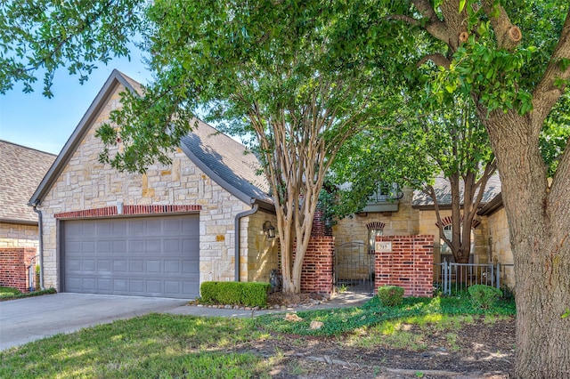 view of front of property featuring a garage