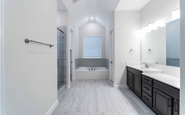 bathroom featuring vanity and separate shower and tub