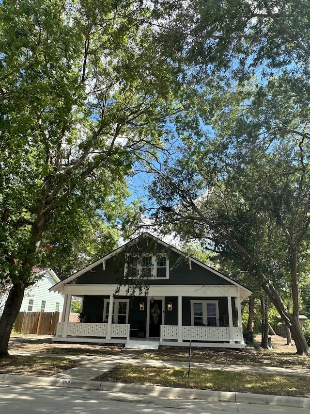 view of front of property featuring covered porch