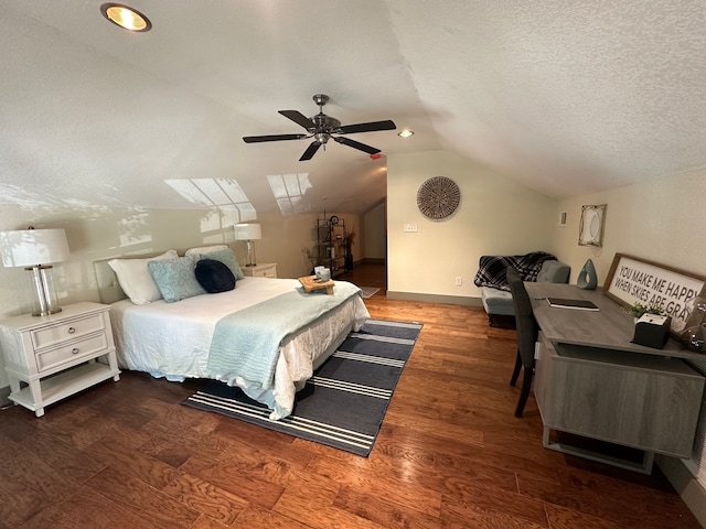 bedroom with ceiling fan, a textured ceiling, lofted ceiling, and dark wood-type flooring