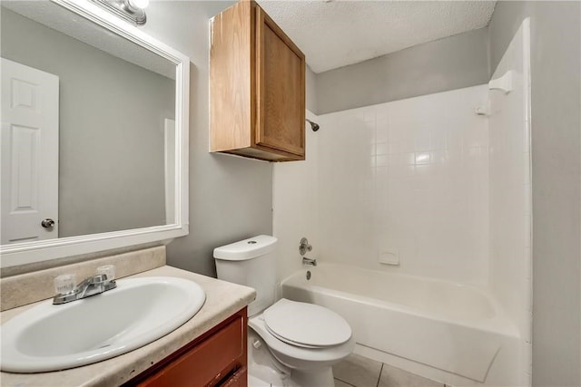 full bathroom with a textured ceiling, vanity, toilet, shower / bath combination, and tile patterned floors