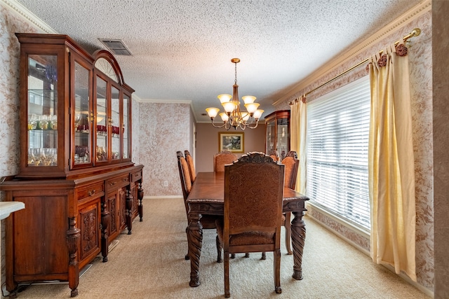 carpeted dining space featuring crown molding, a textured ceiling, and a notable chandelier