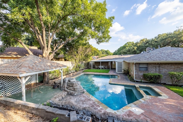 view of pool featuring a gazebo and a patio