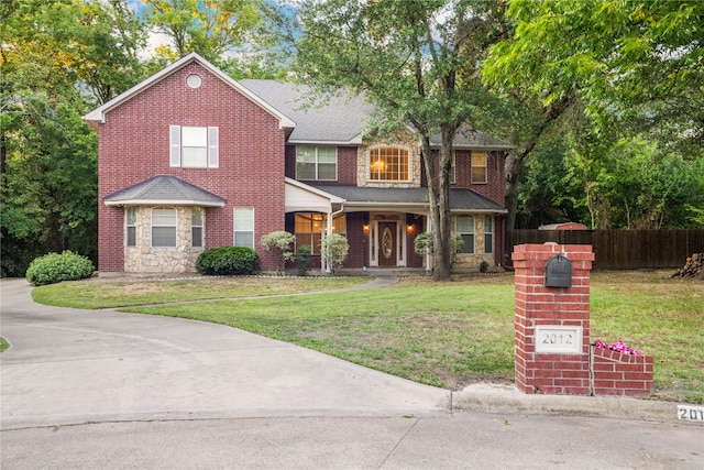 view of front of property with a front lawn