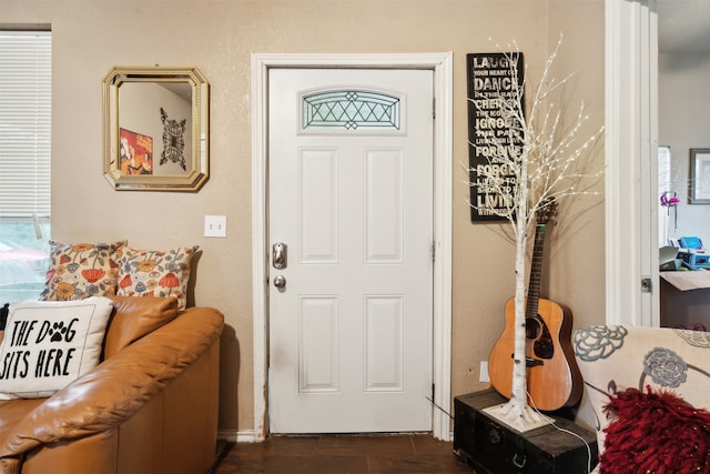 doorway to outside with dark hardwood / wood-style flooring