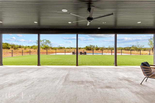 view of patio featuring ceiling fan