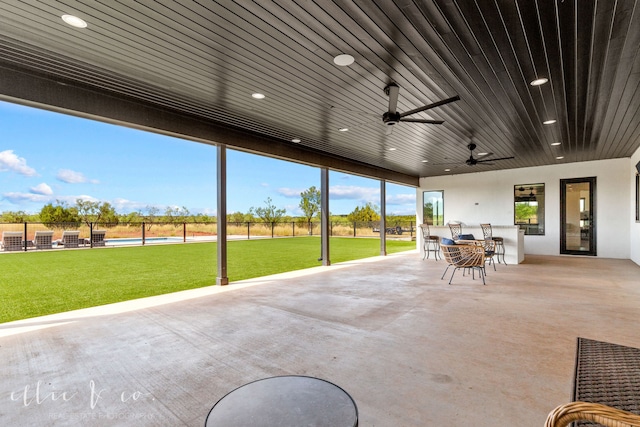 view of patio with ceiling fan