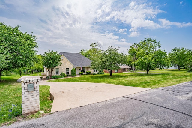 view of front of house with a front lawn