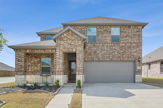 view of front of property with a garage