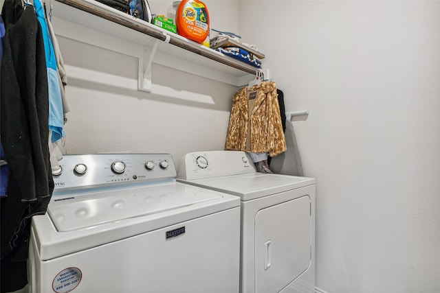 washroom featuring separate washer and dryer