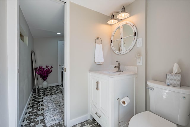 2516 Wildwood Way, Tool, TX 75143 - bathroom featuring toilet, baseboards, tile patterned floors, and vanity