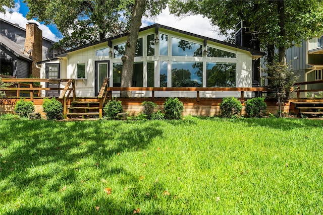 2516 Wildwood Way, Tool, TX 75143 - rear view of property with a sunroom, a yard, and a wooden deck