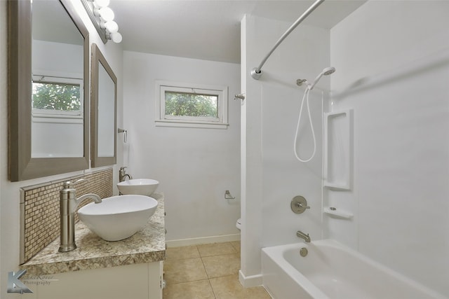 full bathroom with tile patterned flooring, vanity, toilet, and shower / bath combination