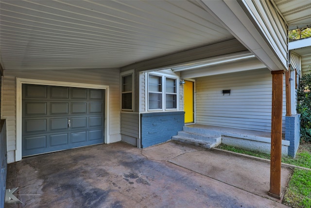 view of exterior entry featuring a garage