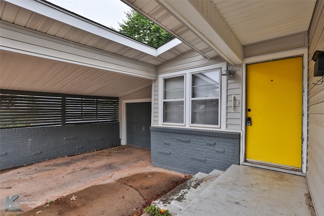 property entrance with a garage